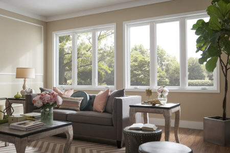 six windows located in living room overlooking trees