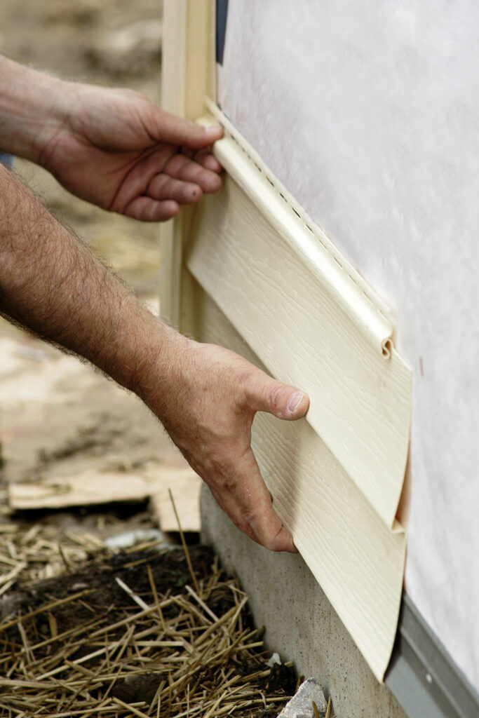 installing siding on house