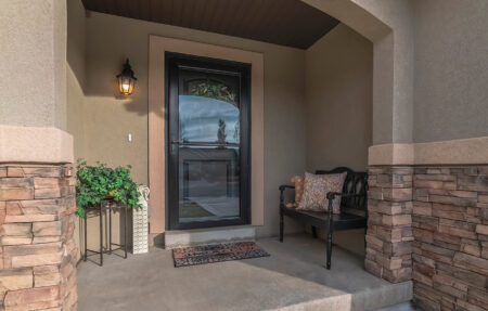 Panorama Glass entrance door with concrete steps day light
