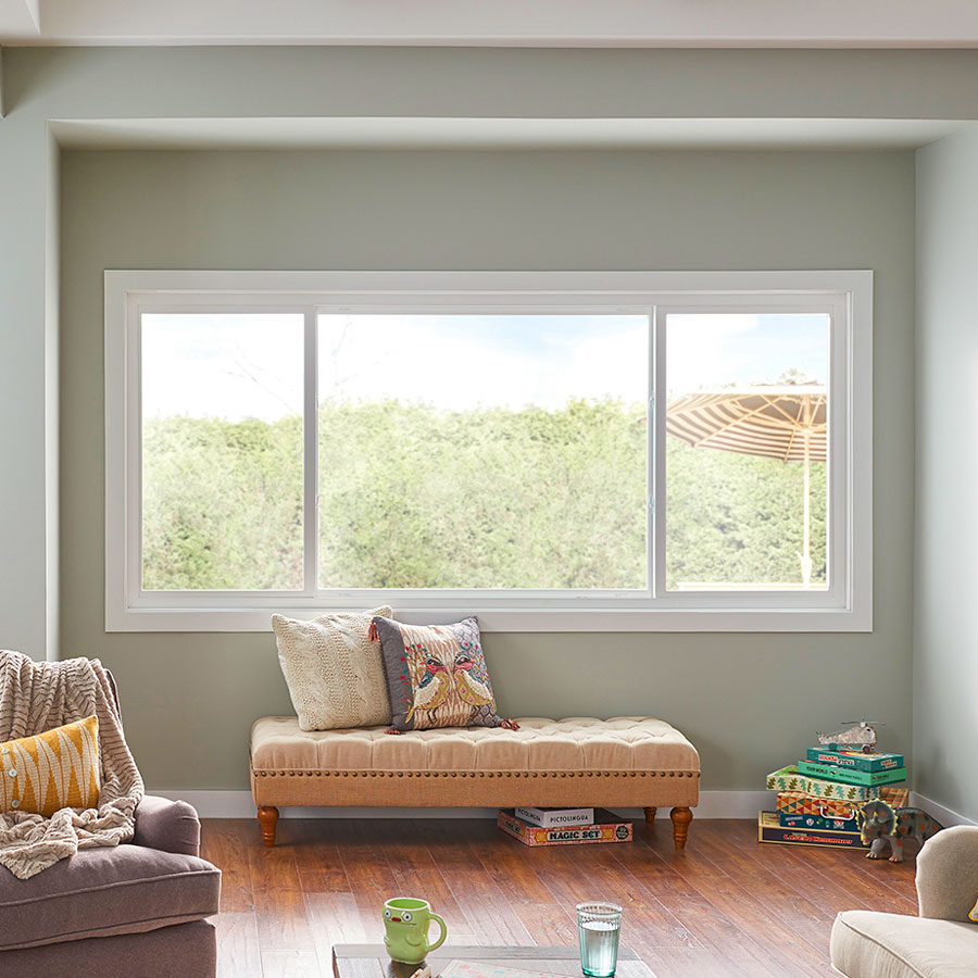 three panel window inside living room overlooking umbrella
